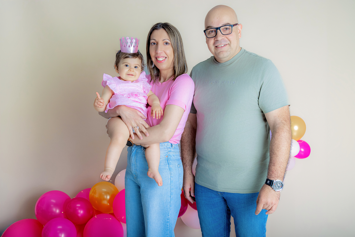 bebe com pais em sessão fotografica