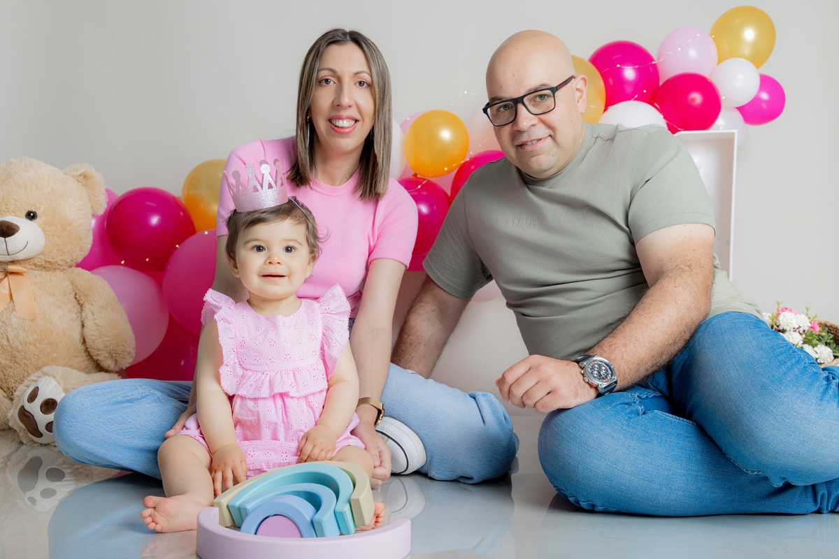 fotografia de bebe com os pais