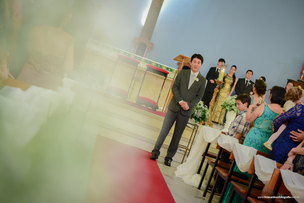 A espera do noivo no altar.