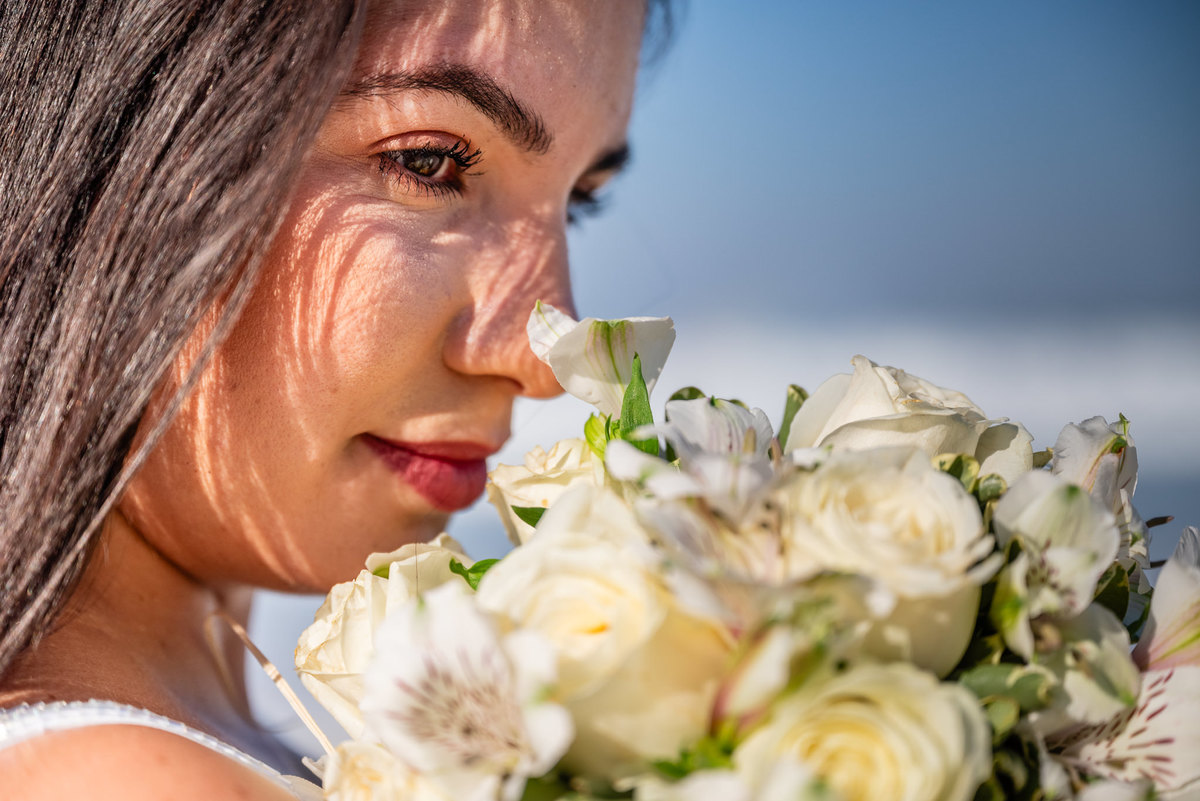 Ensaio fotográfico de família na praia da Barra da Tijuca. Fotografia de Jaque Salles.