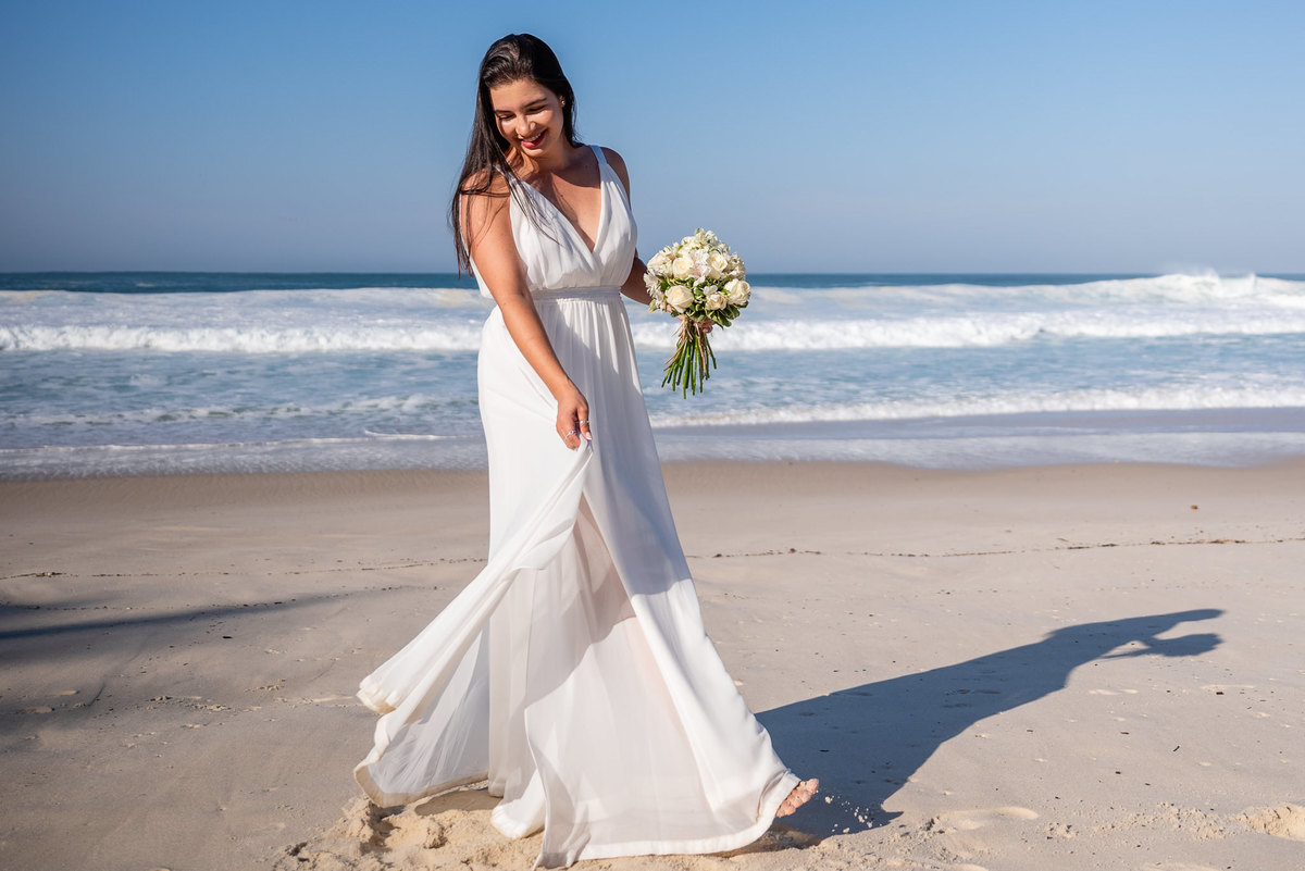 Ensaio fotográfico de família na praia da Barra da Tijuca. Fotografia de Jaque Salles.