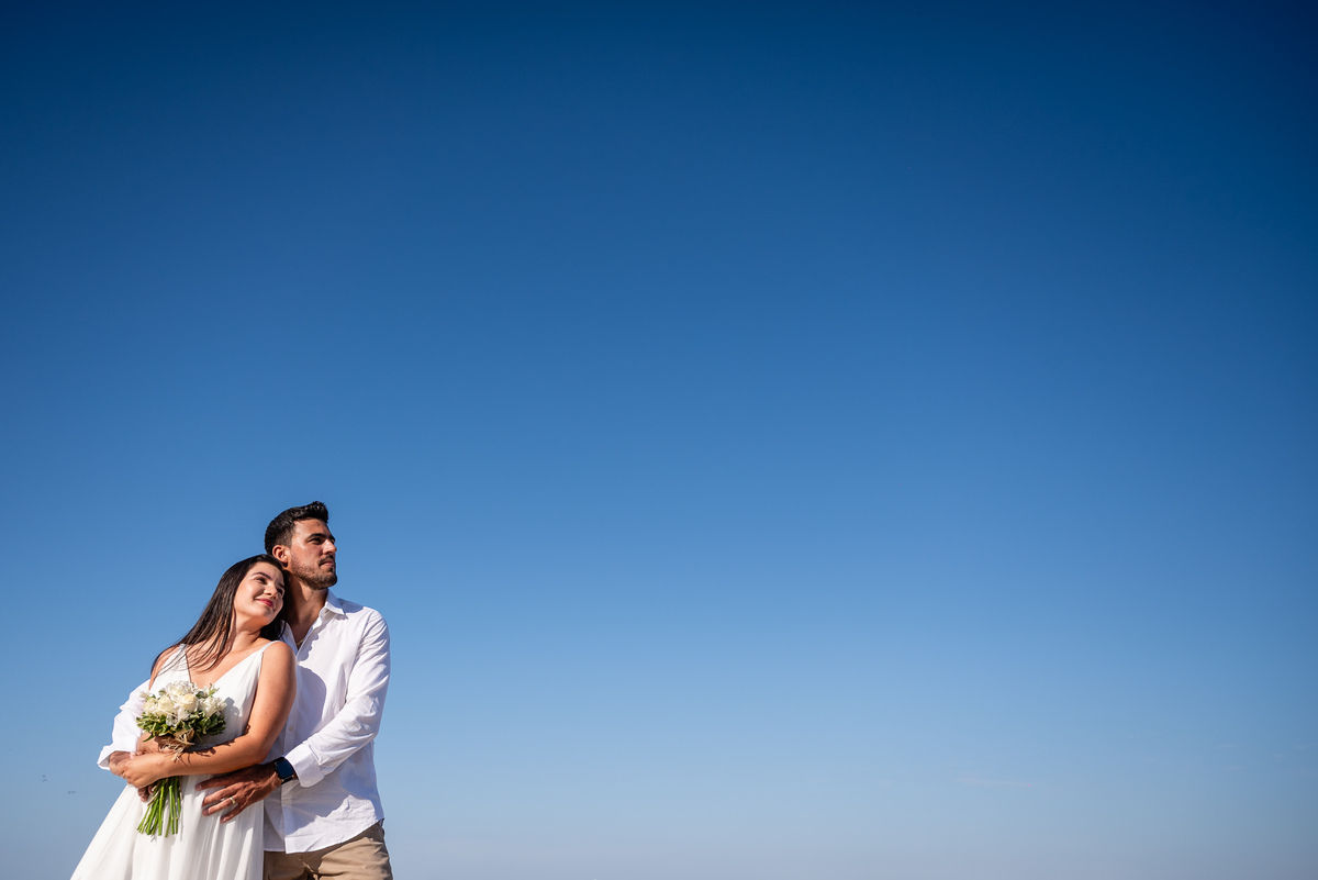 Ensaio fotográfico de família na praia da Barra da Tijuca. Fotografia de Jaque Salles.