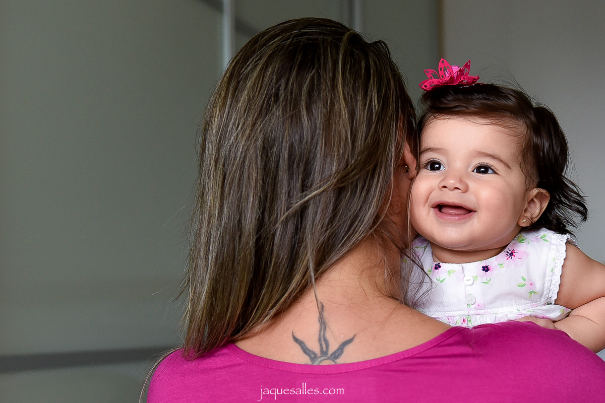 Sorriso de menina de 7 meses