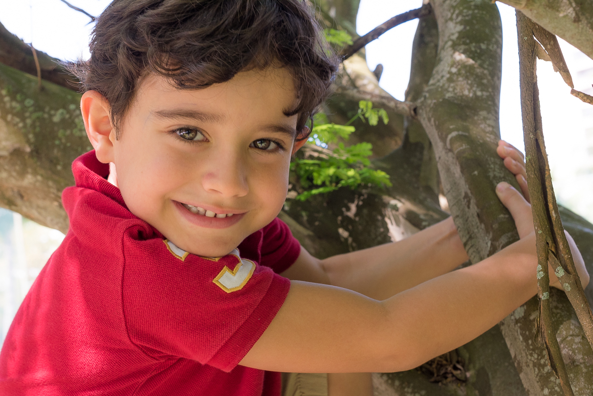 Sorriso de criança sapeca é fotografado durante ensaio fotográfico na Barra da Tijuca
