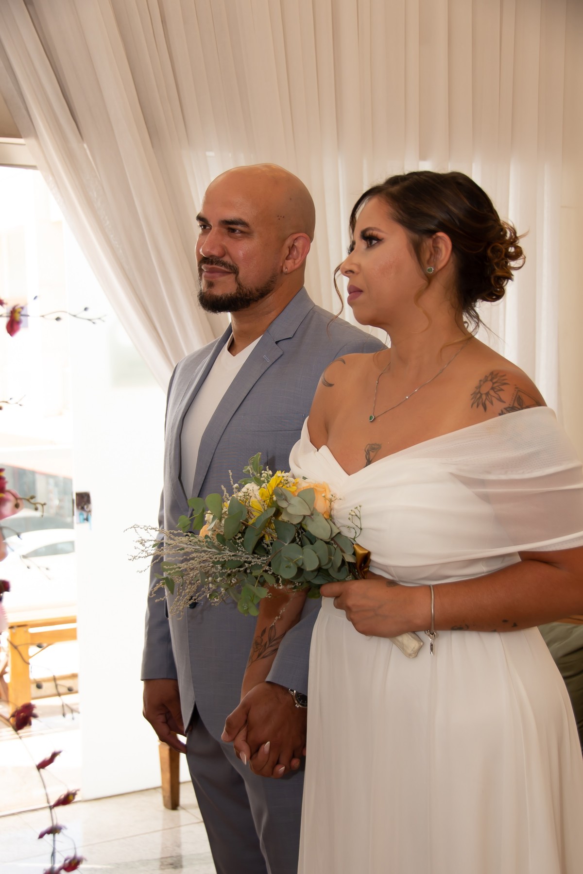 Aqui fiz fotos de detalhes da noiva suas tatuagem 