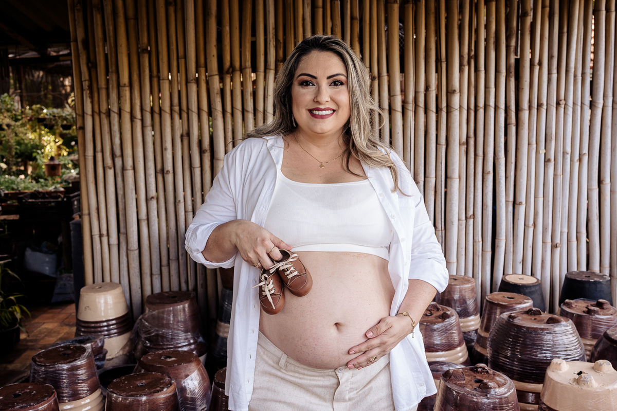 mamae com o sapato na barriga