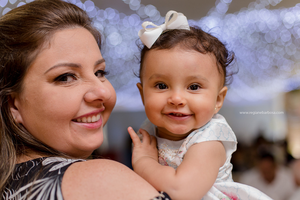 Fotografia infantil Cruzeiro SP Buffet Carinhoso Tema o jardim das borboletas azul rosa amarelo Fotografa Regiane Barbosa espontaneidade e beleza