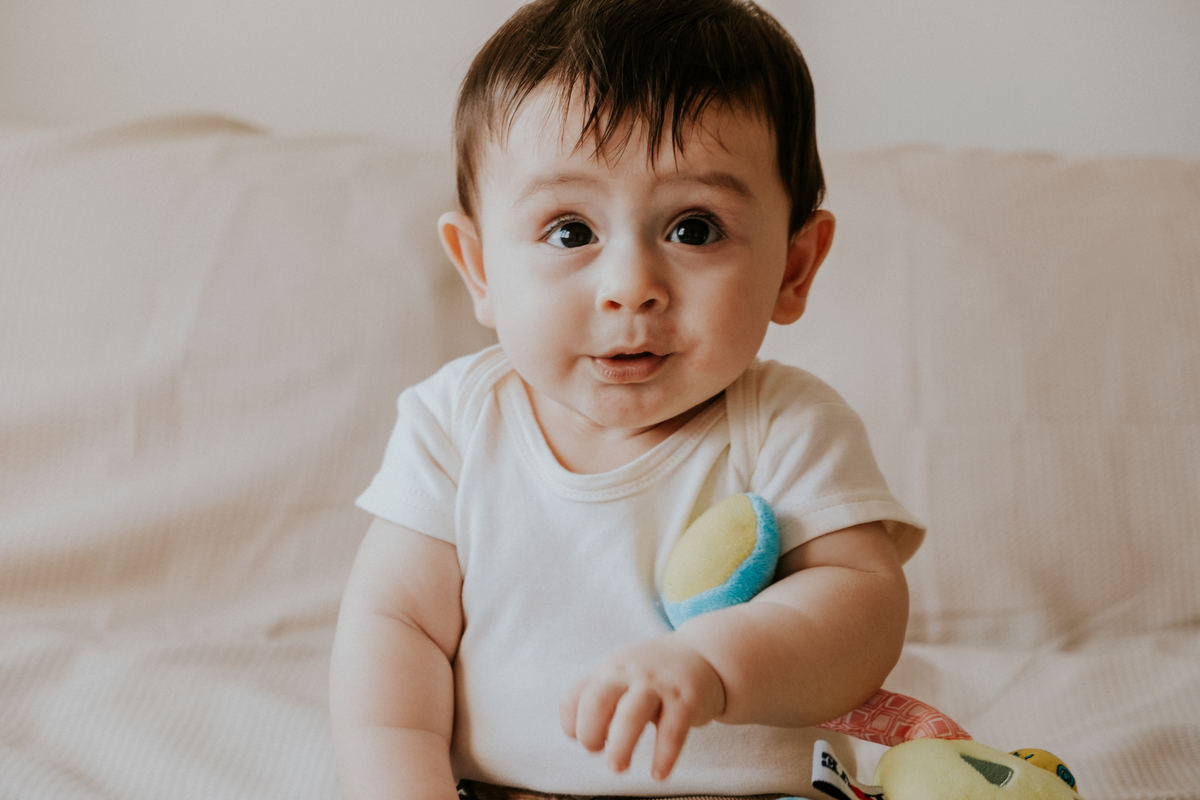 Acompanhamento fotográfico infantil de seis meses feito por Anderson Crepaldi Fotografia