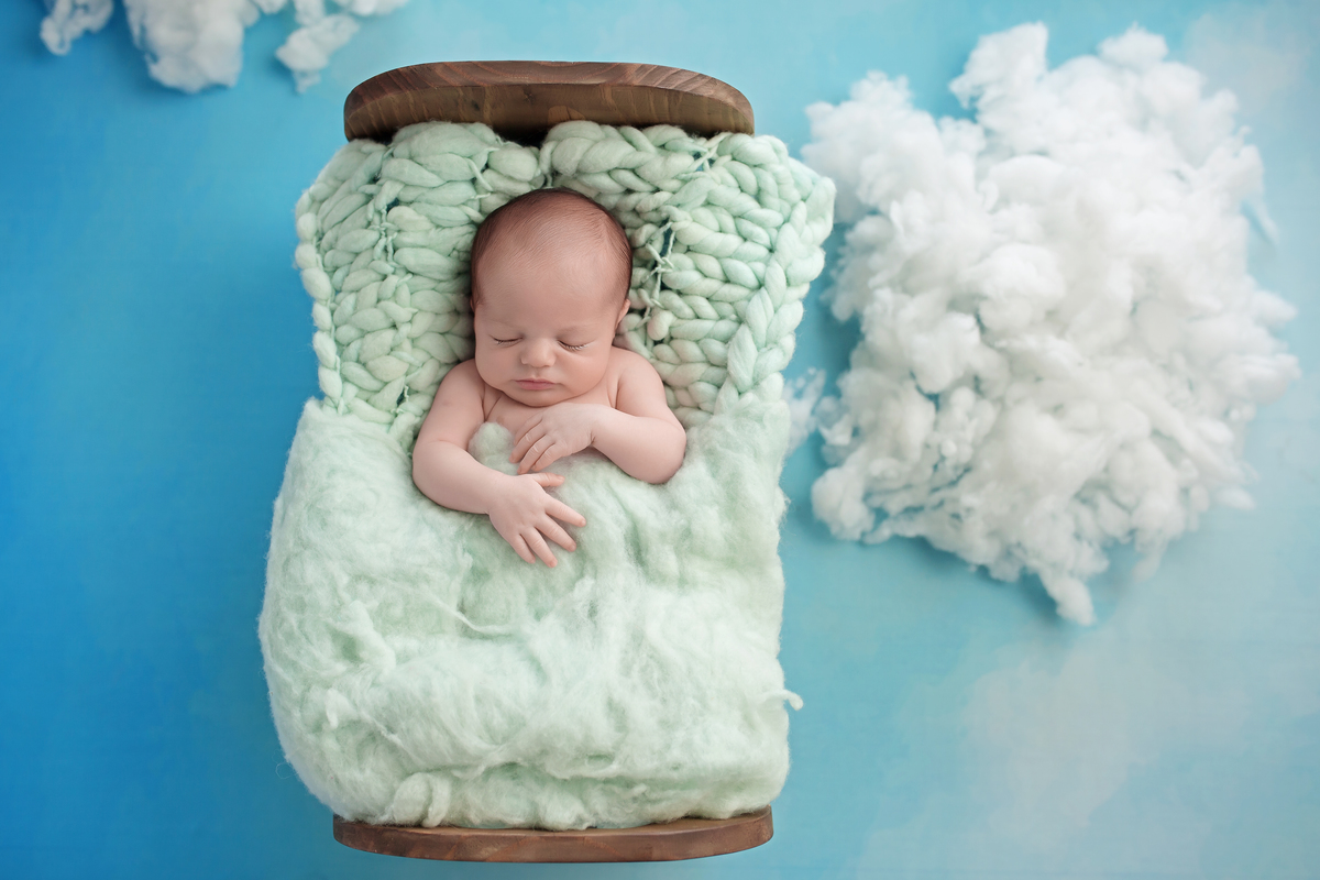 Céu Azul Claro + Berço de Madeira