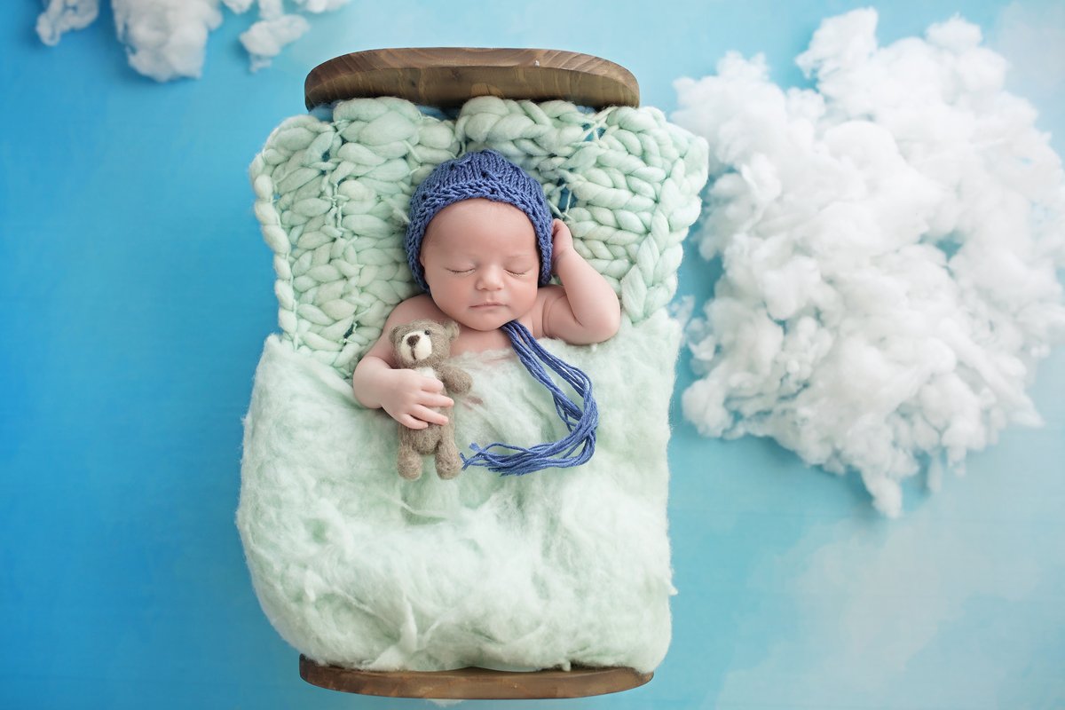 Céu Azul Claro + Berço de Madeira