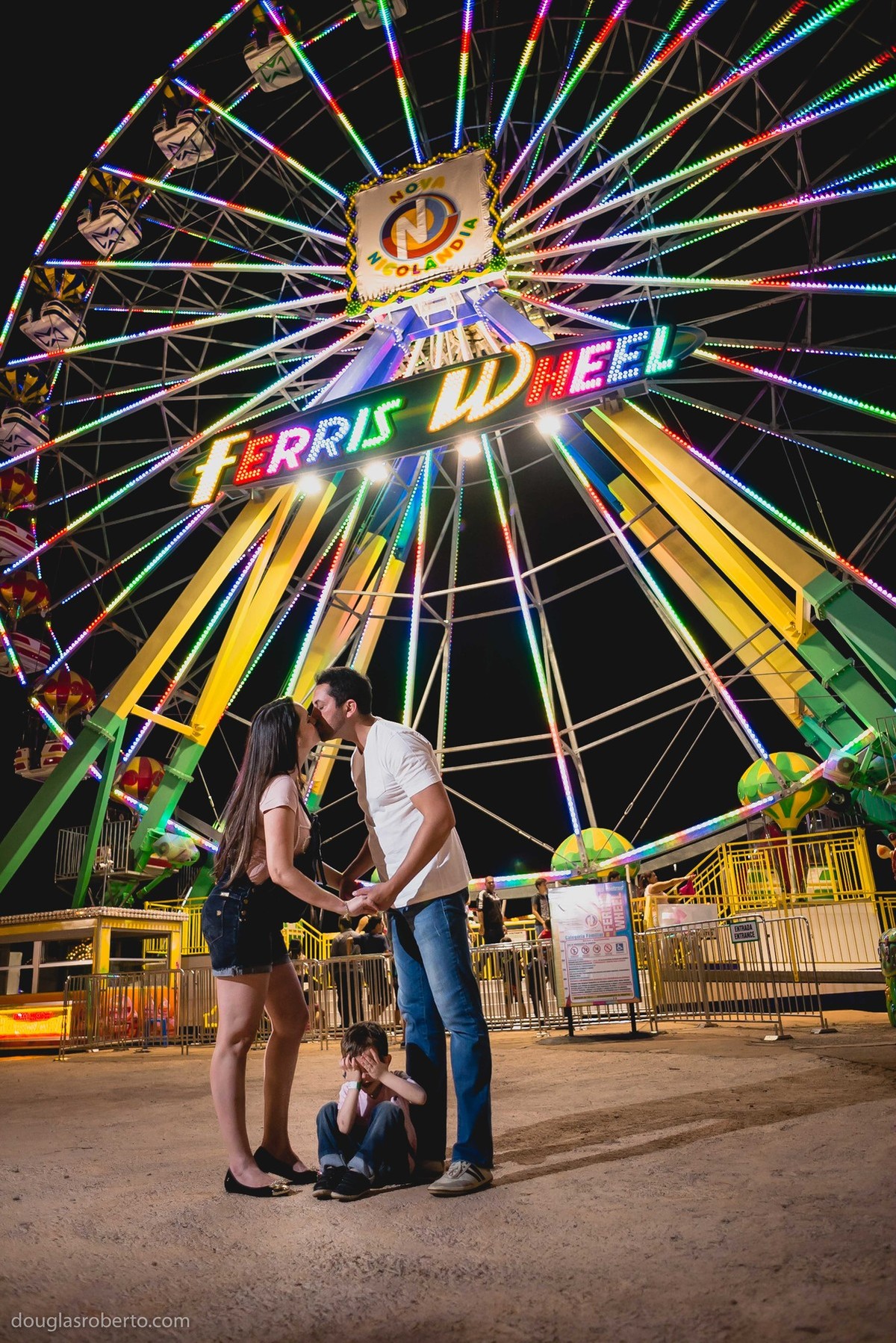 família no parque de diversão