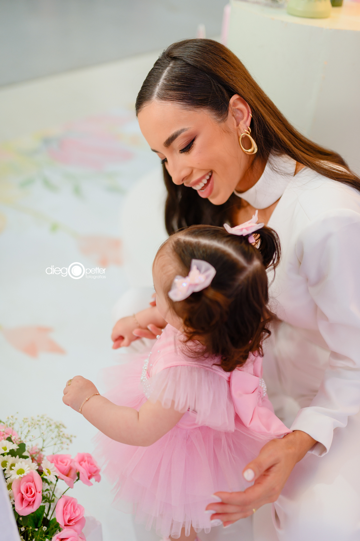 mãe e filha no aniver de 1 ano