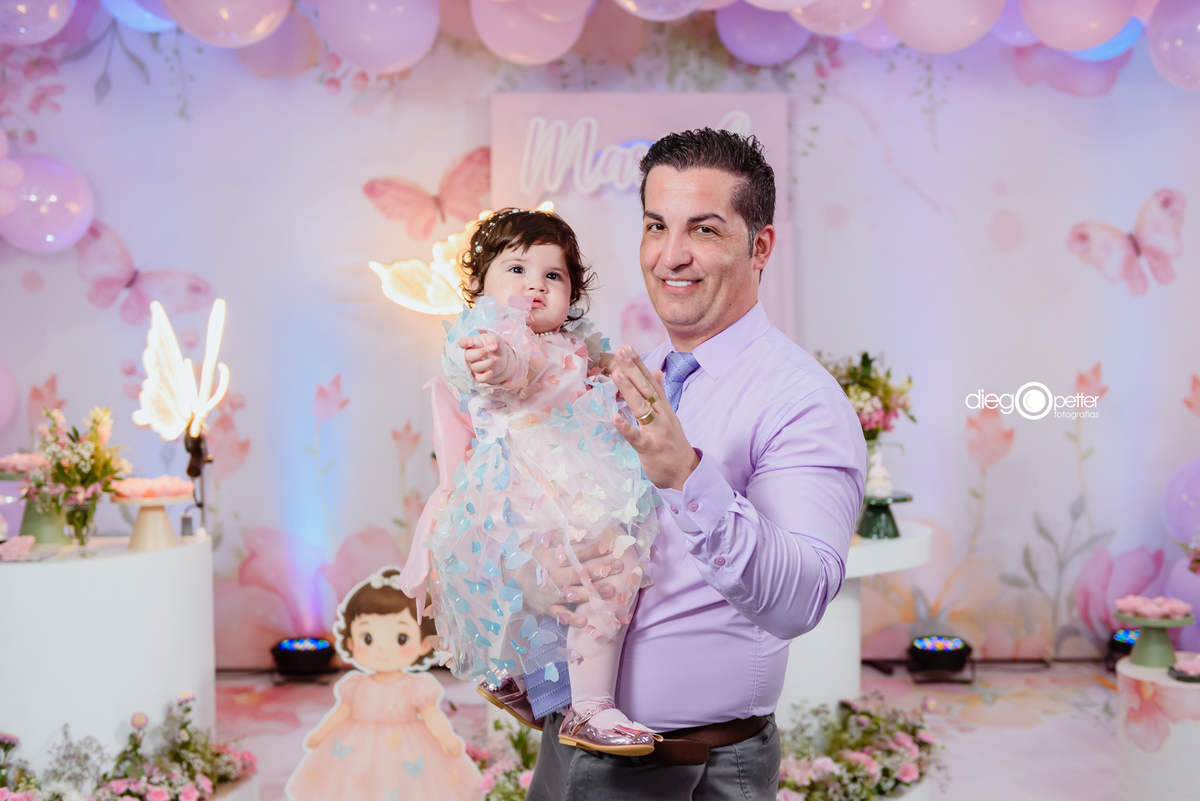 pai com filha no primeiro aninho