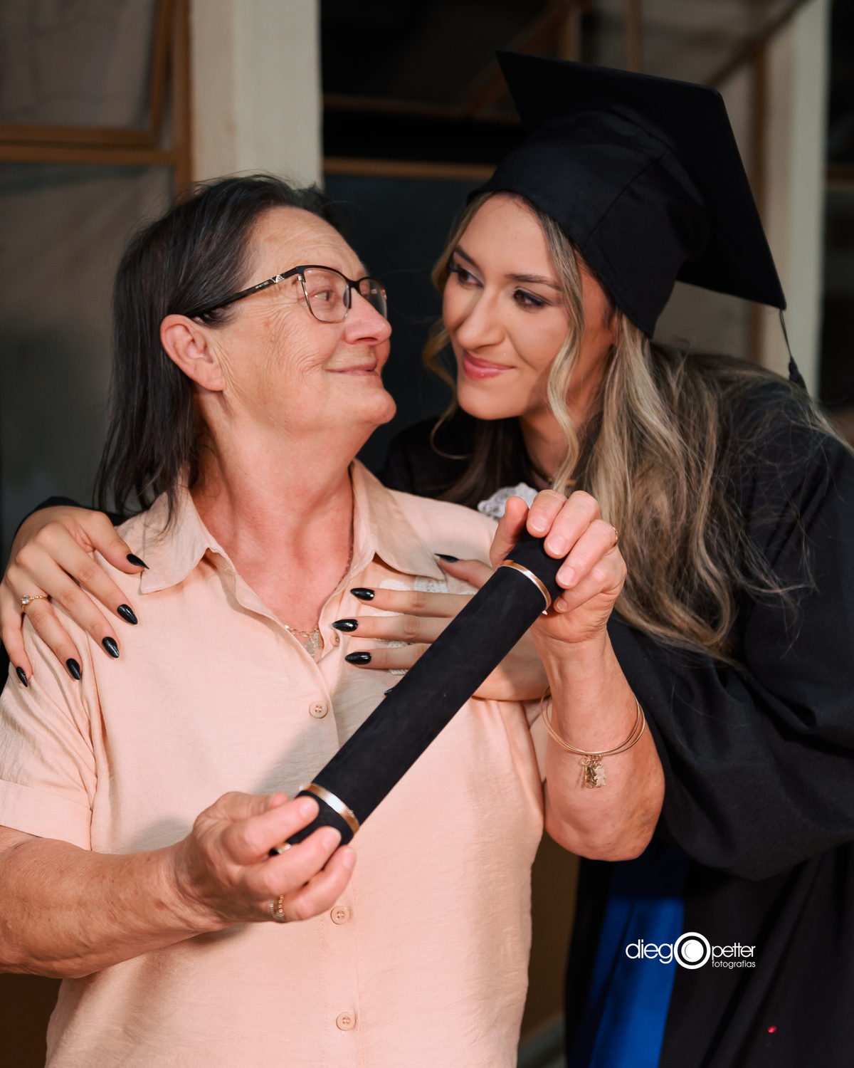 formanda com avó e canudo