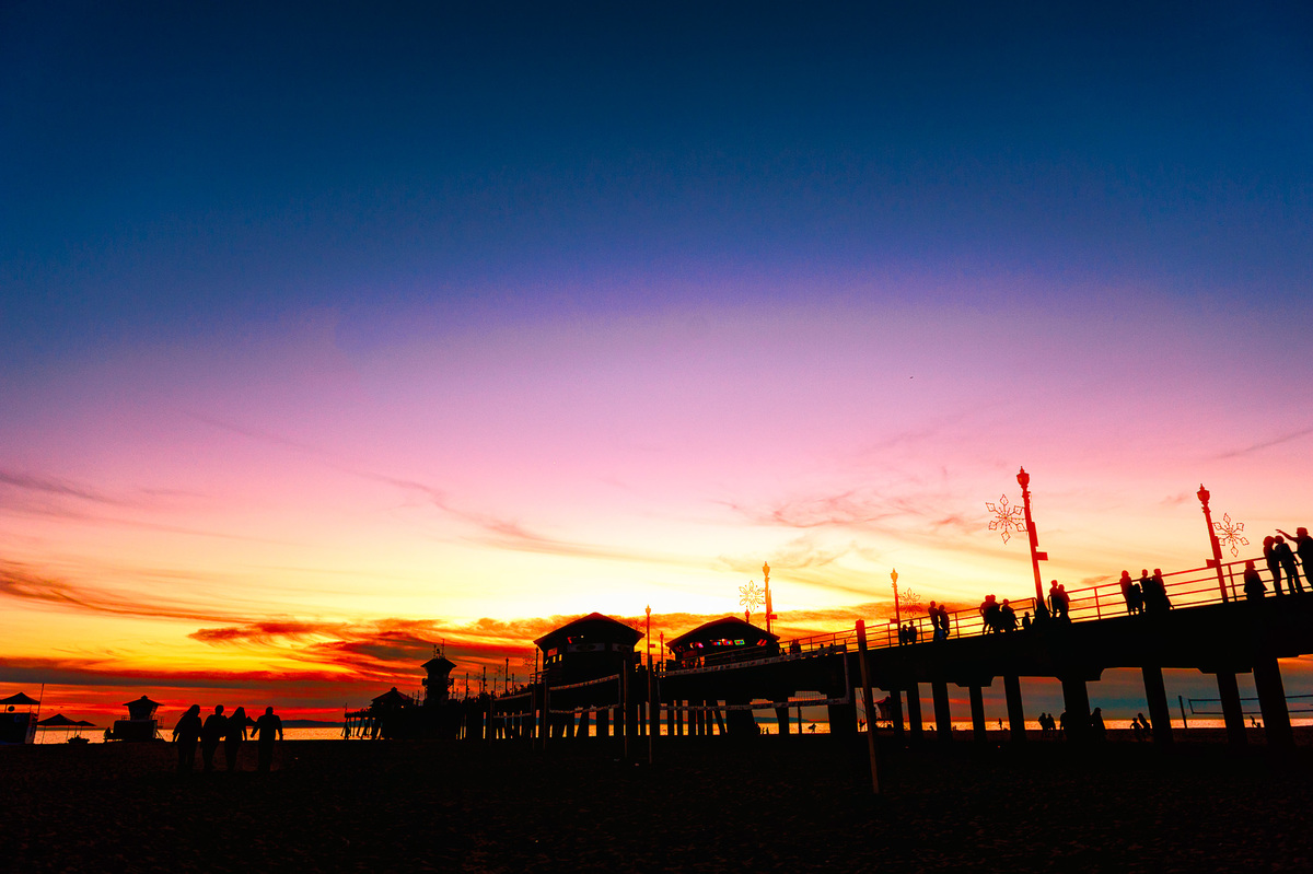 foto do Pôr do Sol final da tarde no Huntington Beach Pier em Los Angels Califórnia. Fisherman’s Wharf. North Beach, Chinatown e Embarcadero