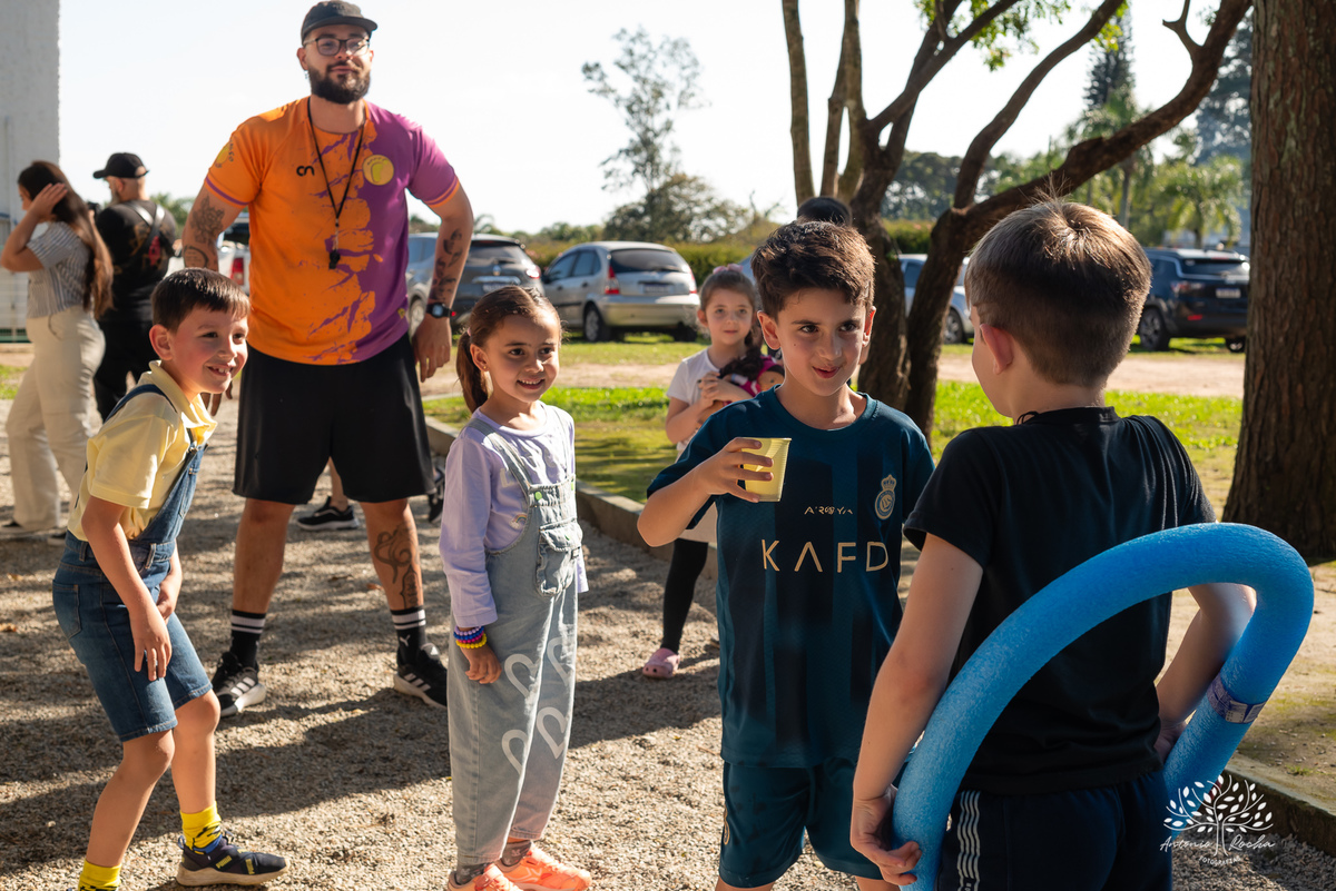 fotografia infantil - festa de aniversário - 7 anos - tema Minions - pé descalço - fotografia profissional - Antonio Rocha Fotografias - aniversário ao ar livre - Pelotas - Caça e Pesca - celebração em família - Antonio Rocha Fotografias - Festa Criança