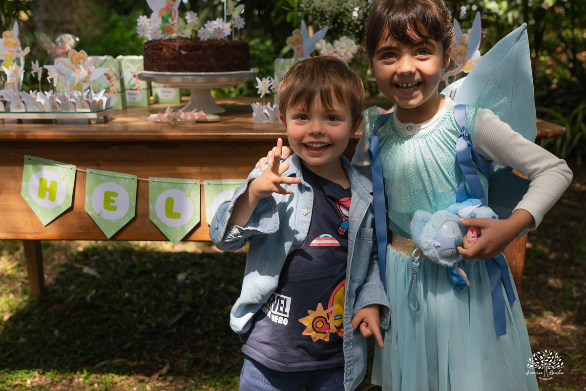 fotografia festa infantil - aniversario no sitio - aniversario ao ar livre - fotografo infantil - festa em familia - fotografia espontanea – sininho - fotografo de festas – antonio rocha fotografias – pelotas – bolo de chocolate - cachorro quente - tobogã