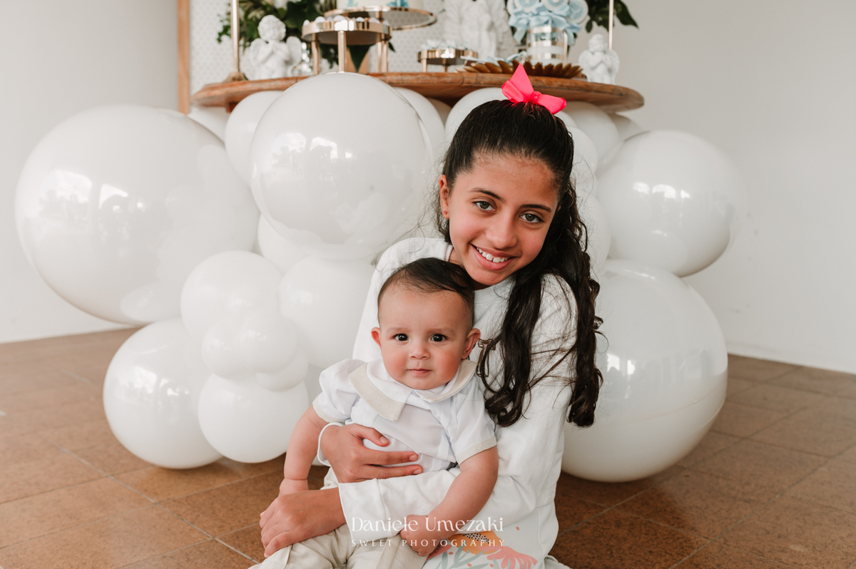 Fotografia de batizado em Mogi das Cruzes. Cerimônia do Matteo na Igreja do Socorro e almoço no Recanto da Vila, com decoração da Jaque Festas Decor. Registro afetivo por Dani Umezaki. fotografia de batizado Mogi das Cruzes, fotógrafa de batizado SP