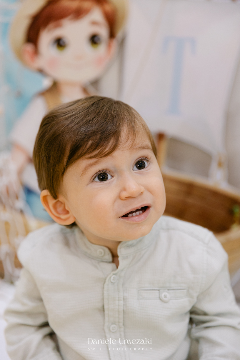 Aniversário de 1 ano do Thiago realizado no Buffet Jokempô em Mogi das Cruzes, registrado por Dani Umezaki com fotografias espontâneas e cheias de emoção