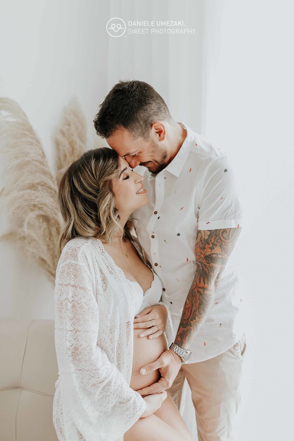 Ensaio gestante em Mogi das Cruzes com o casal – fotografia espontânea por Dani Umezaki.