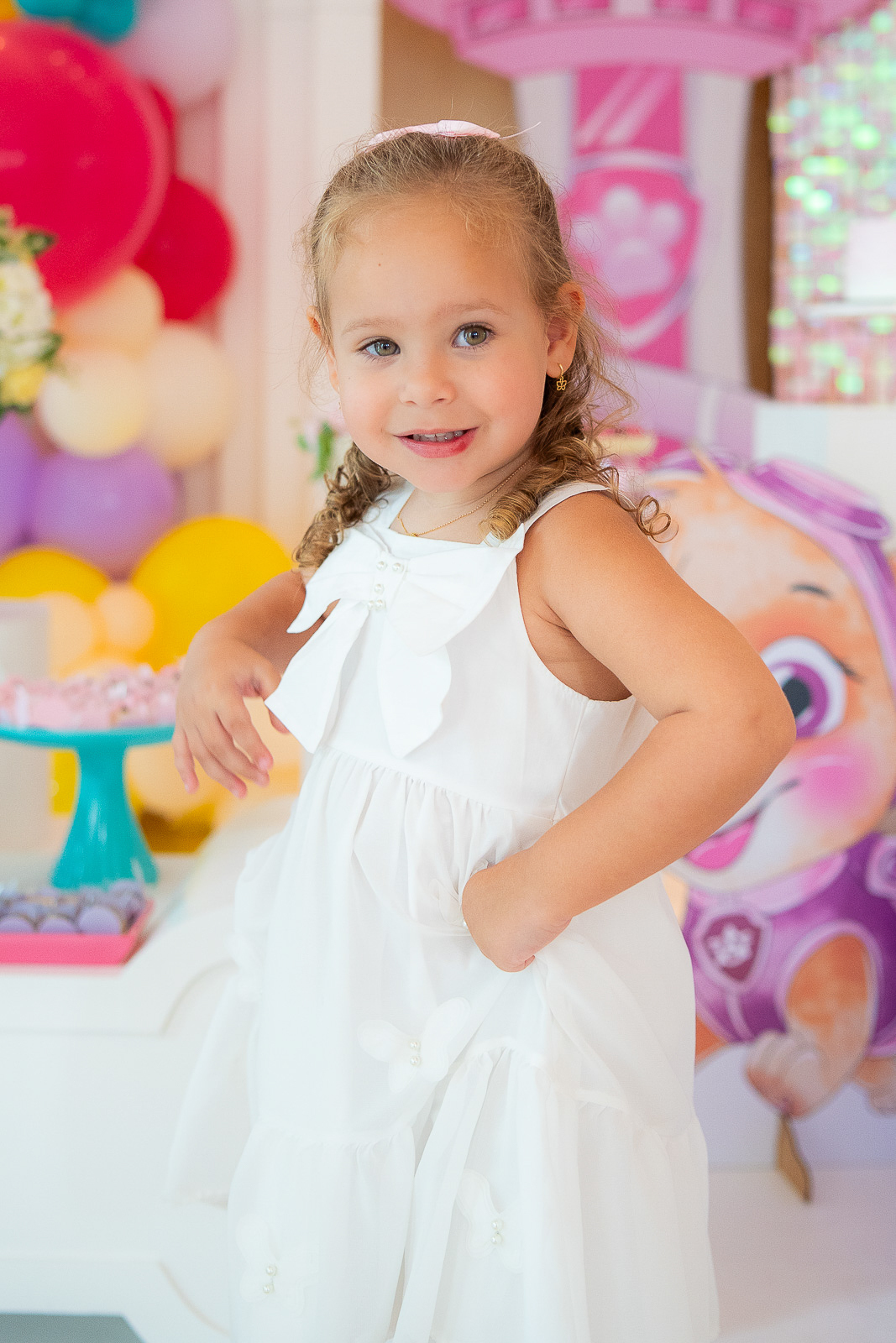 Aniversariante fazendo posse para a foto