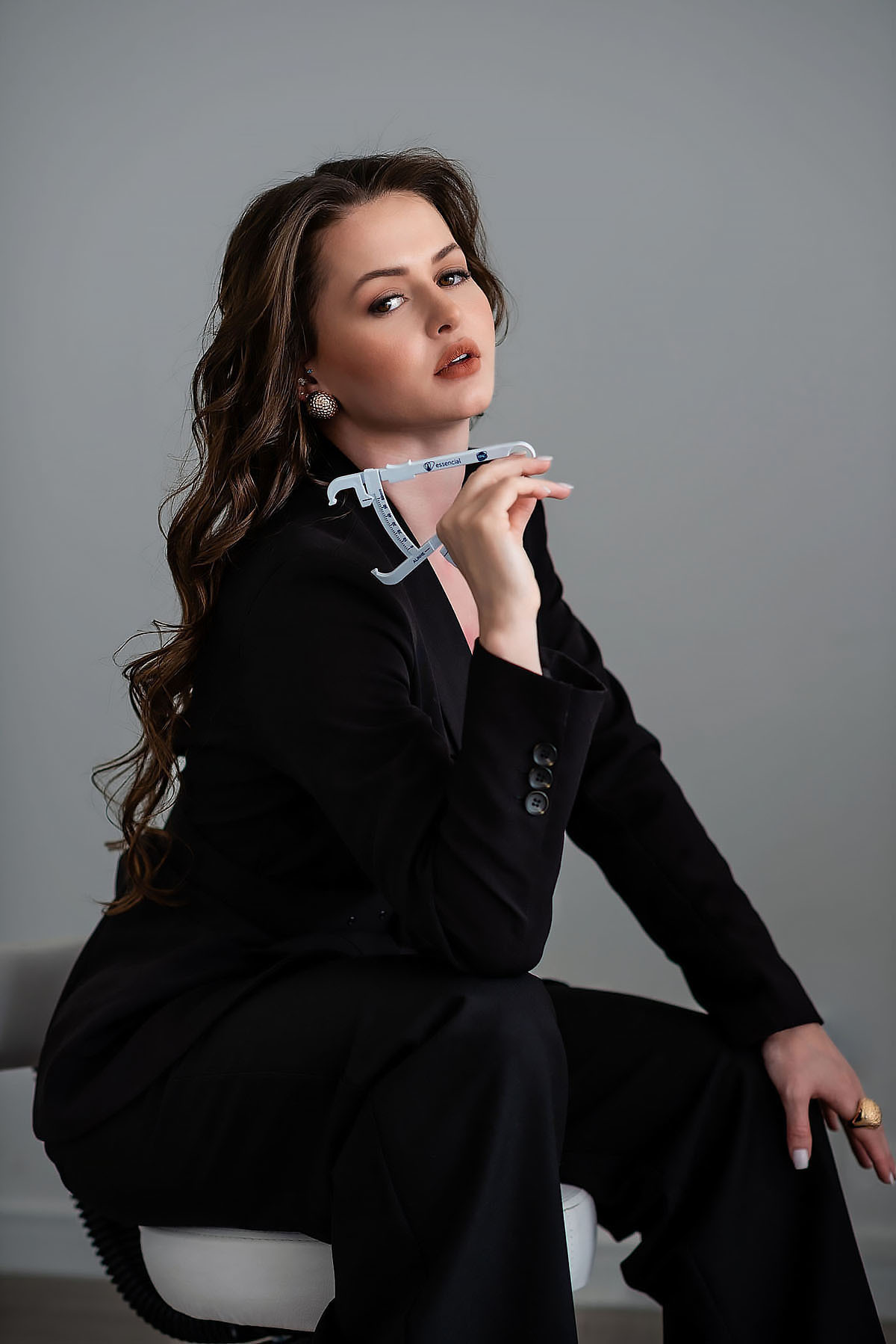 fotos de esteticista profissional com fita métrica