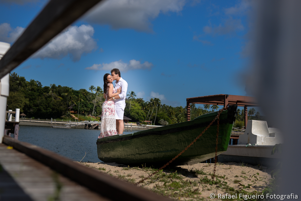 casal em pé canoa pescador areia rio timbo maria farinha