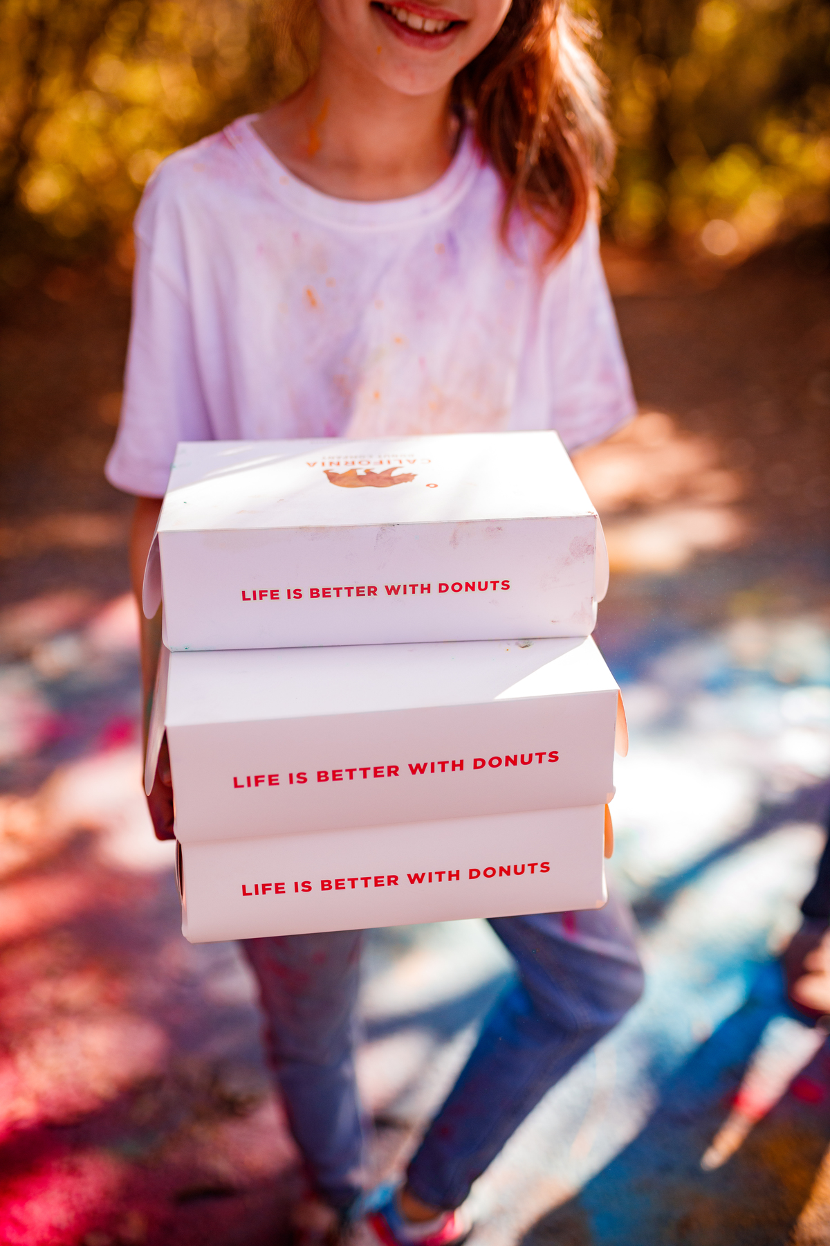 Fotografa familia Curitiba - externo com cores pó colorido California donuts