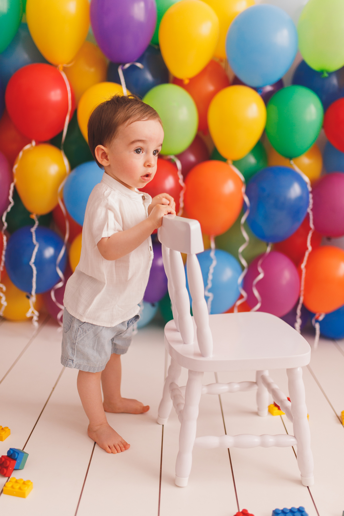 fotografa familia curitiba ensaio estudio colorido balaos brinquedos 