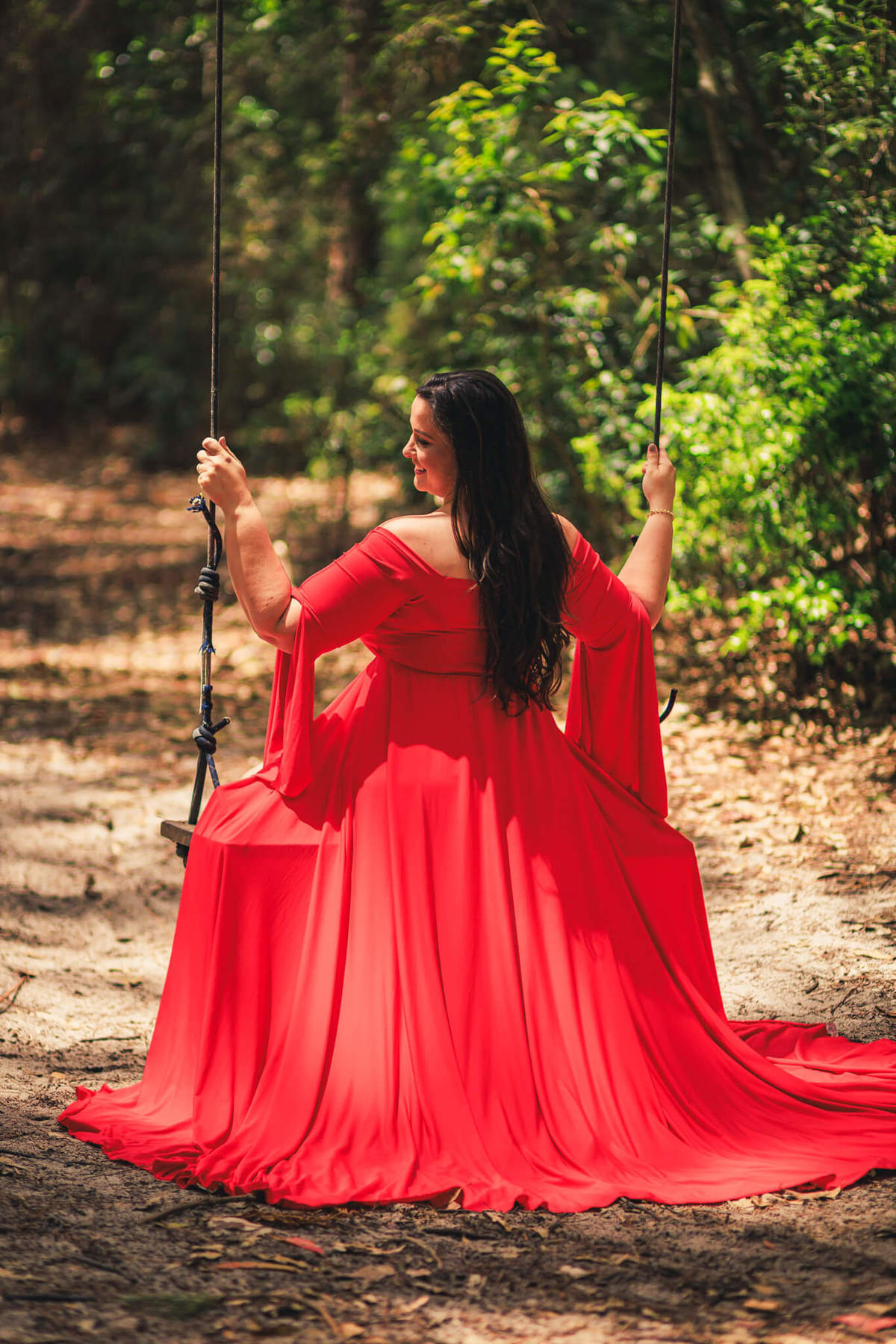 Um clique espontâneo, com risadas que traduzem a felicidade da família.