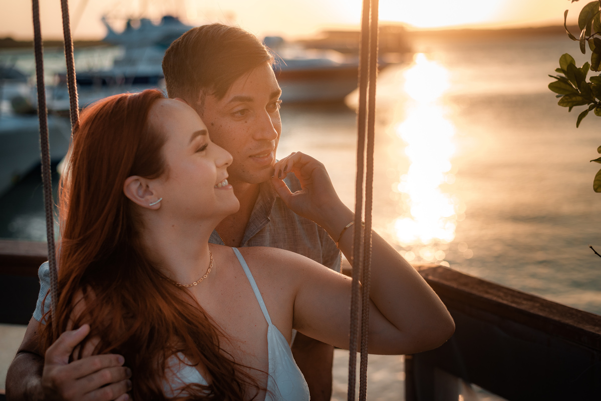 Ensaio de Casal no Iate Clube do Natal - Natal, Rio Grande do Norte - Ensaio ao por do sol - ensaio no veleiro -  veleiro - velejar - forte dos reis magos