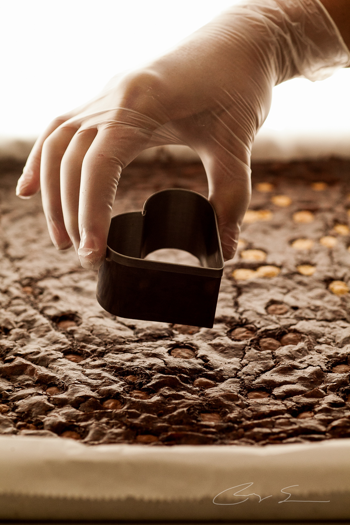 brownie santo chocolate chef coração recheado e-commerce delivery comida fotografia de alimentos gastronomia cozinha cardápio ifood rappi ubereats delícias da vovo chocolate belga meio amargo empresário retratos profissionais