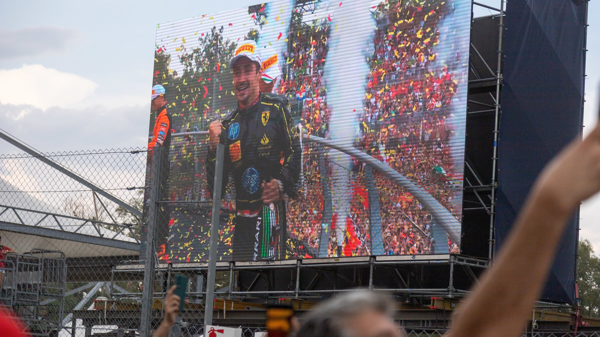 Charles Leclerc celebrating the win for Ferrari