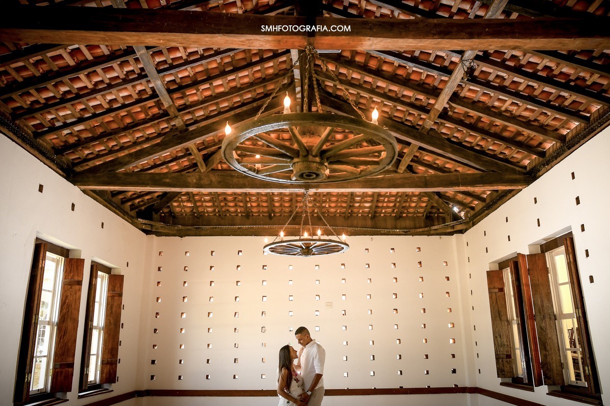 ensaio fazenda quilombo ensaio de gestante maria e gui bernardo a caminho ensaio de dia por do sol lagoa passaros voando canoa 