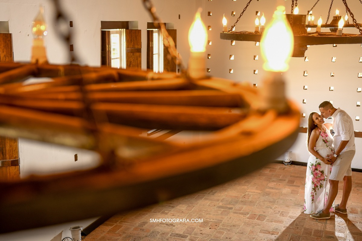 ensaio fazenda quilombo ensaio de gestante maria e gui bernardo a caminho ensaio de dia por do sol lagoa passaros voando canoa 