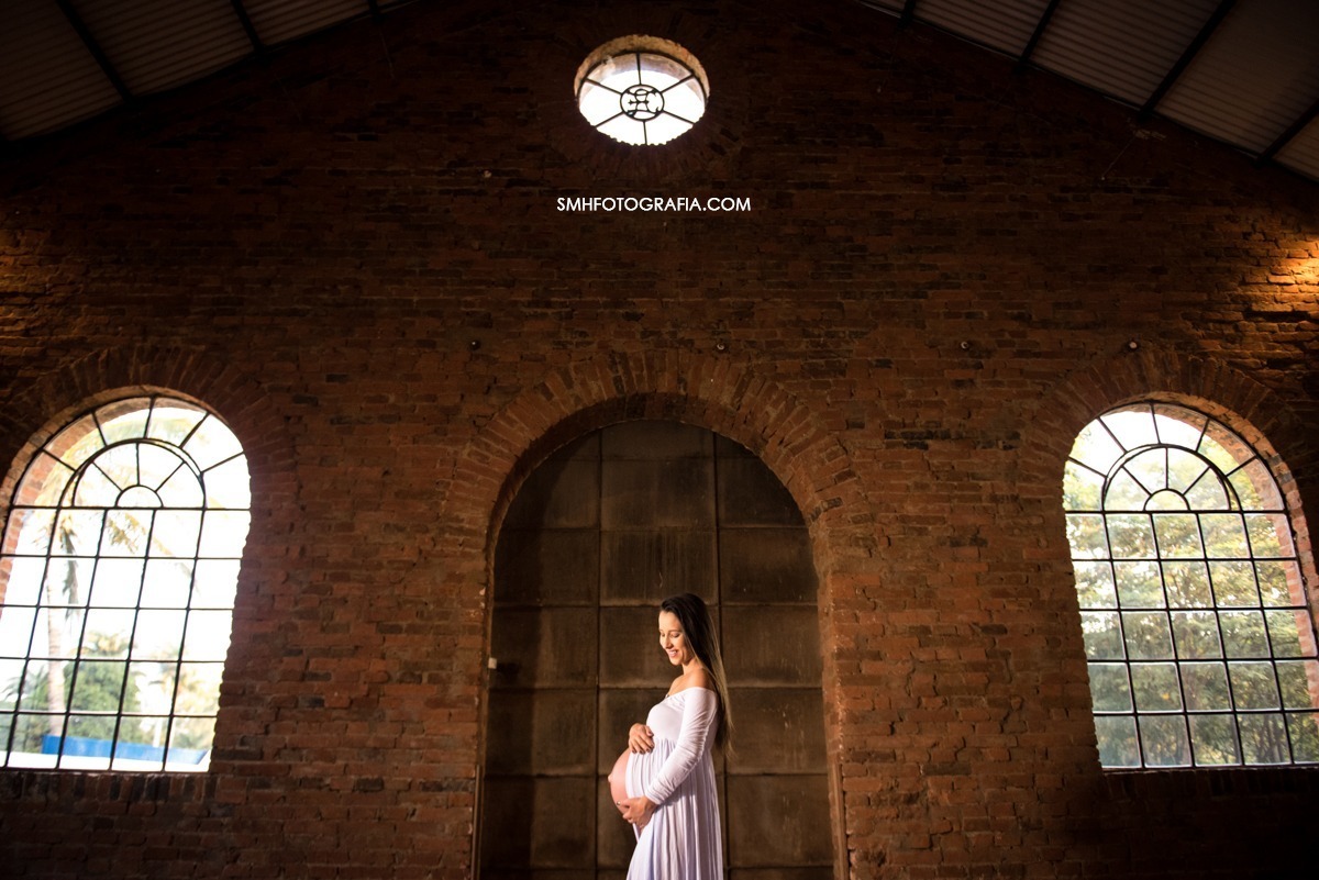 ensaio fazenda quilombo ensaio de gestante maria e gui bernardo a caminho ensaio de dia por do sol lagoa passaros voando canoa 