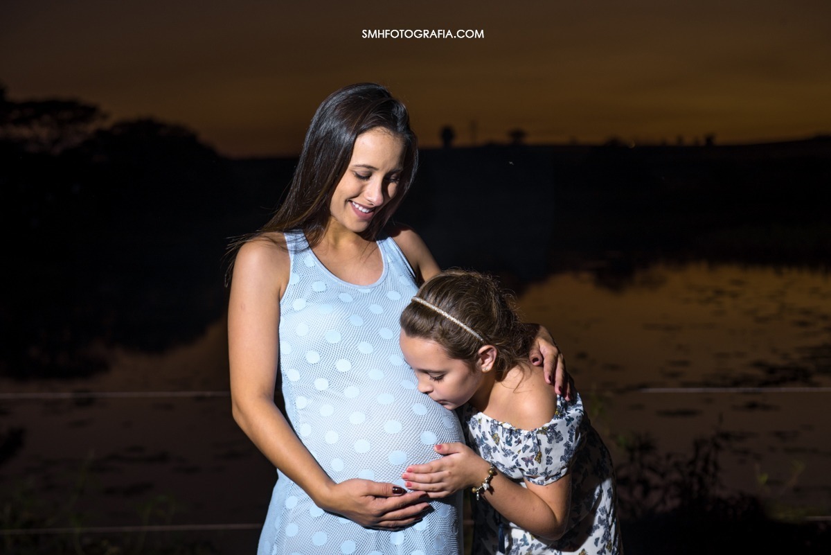 ensaio fazenda quilombo ensaio de gestante maria e gui bernardo a caminho ensaio de dia por do sol lagoa passaros voando canoa 