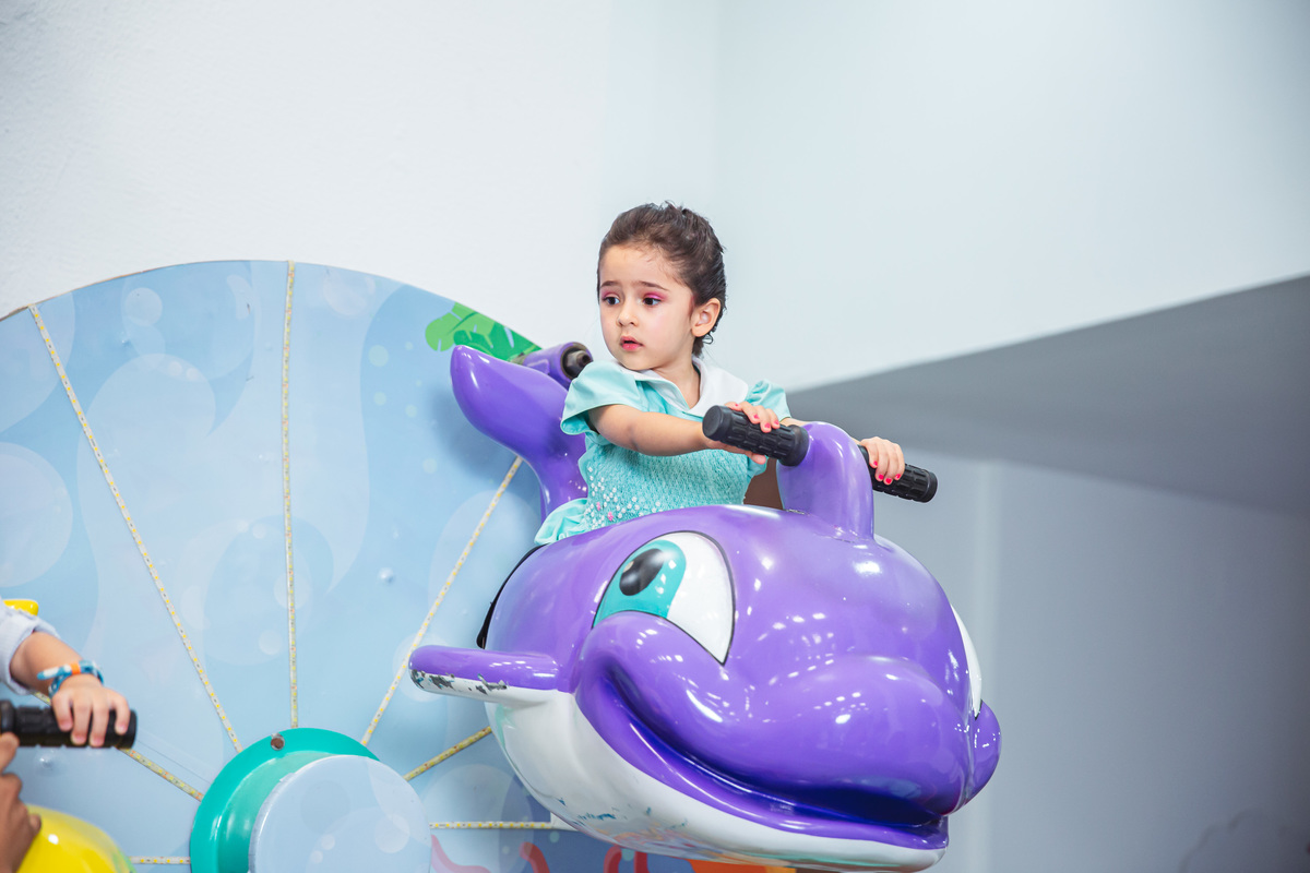 Crie um texto para meu site de fotografia falando sobre como foi fotografado a festa de 4 anos da Sophia Tema do aniversário: Frozen no buffet Dudabaluza