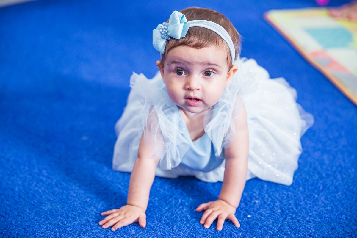 Crie um texto para meu site de fotografia falando sobre como foi fotografado a festa de 4 anos da Sophia Tema do aniversário: Frozen no buffet Dudabaluza