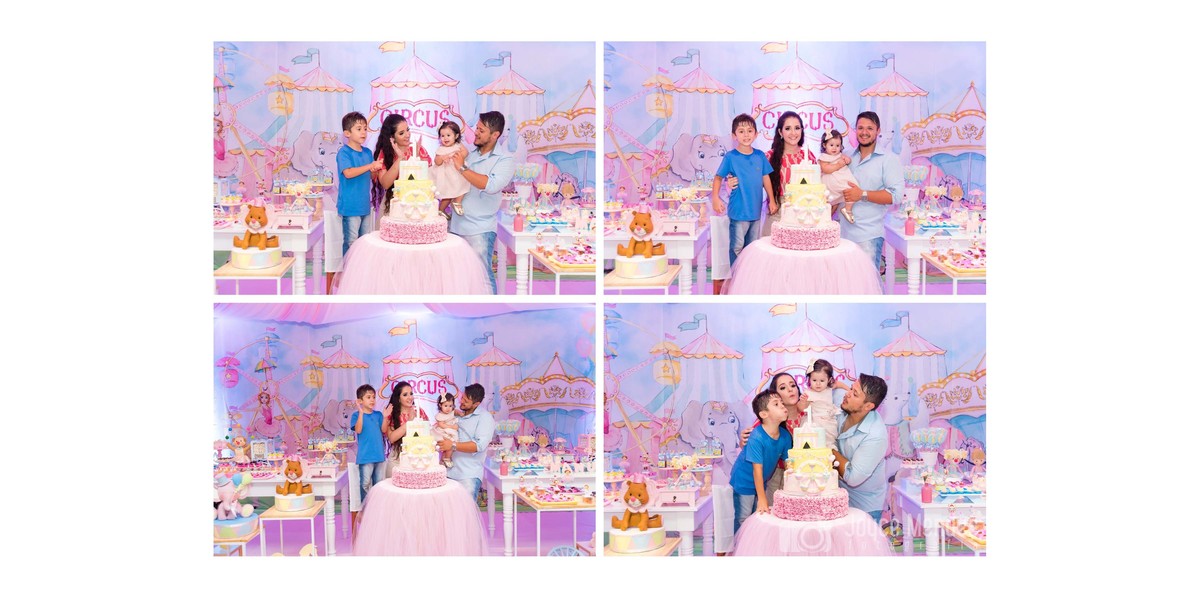 Fotografia da família em momento único, cantando parabéns para a aniversariante de um aninho em festa com o Tema Circo Rosa,