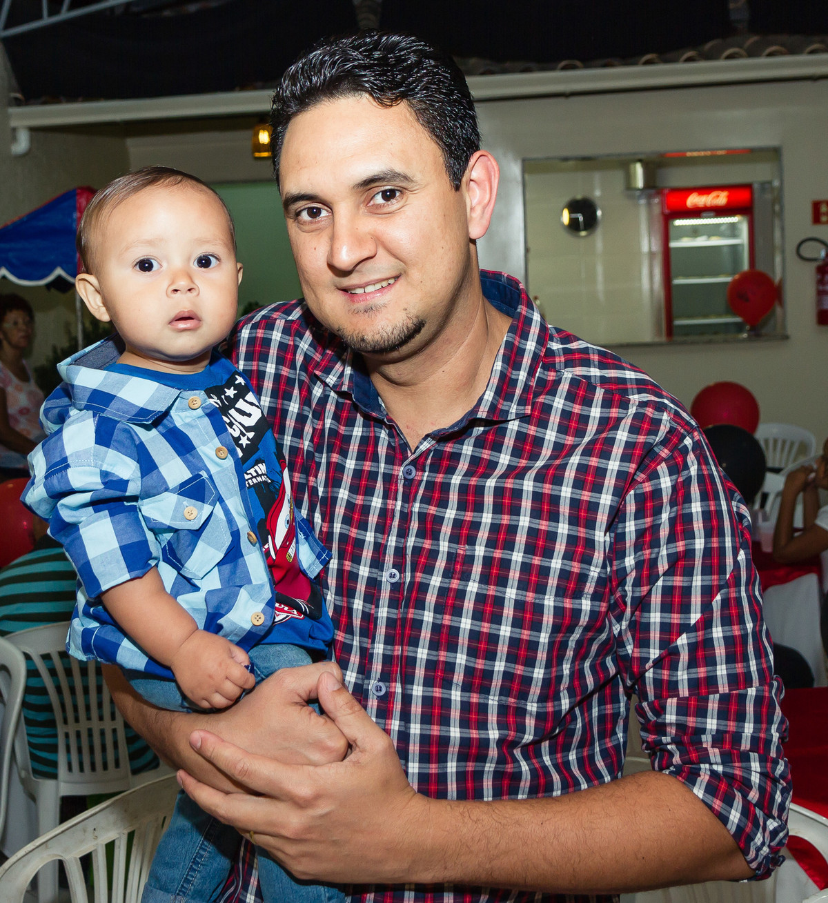 Isaac e seu pai pelo fotógrafo Douglas Maia