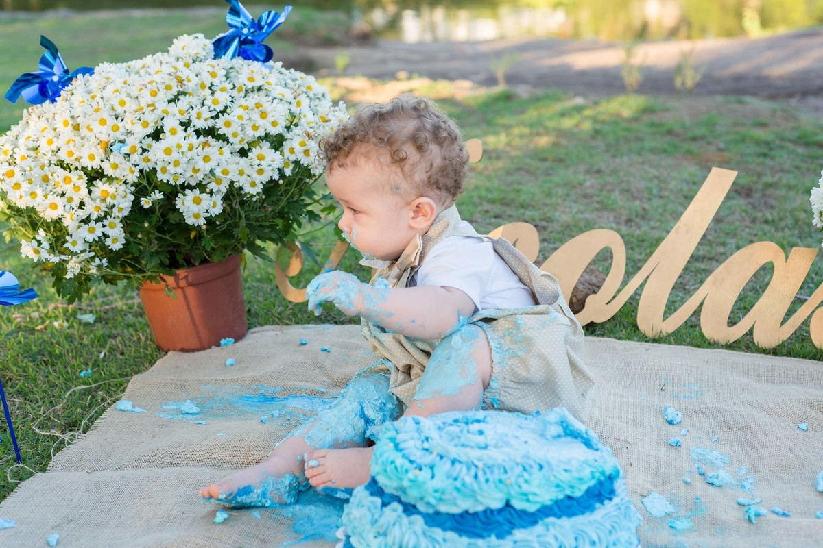 Nicolas com a perna toda suja pelo fotógrafo Douglas Maia