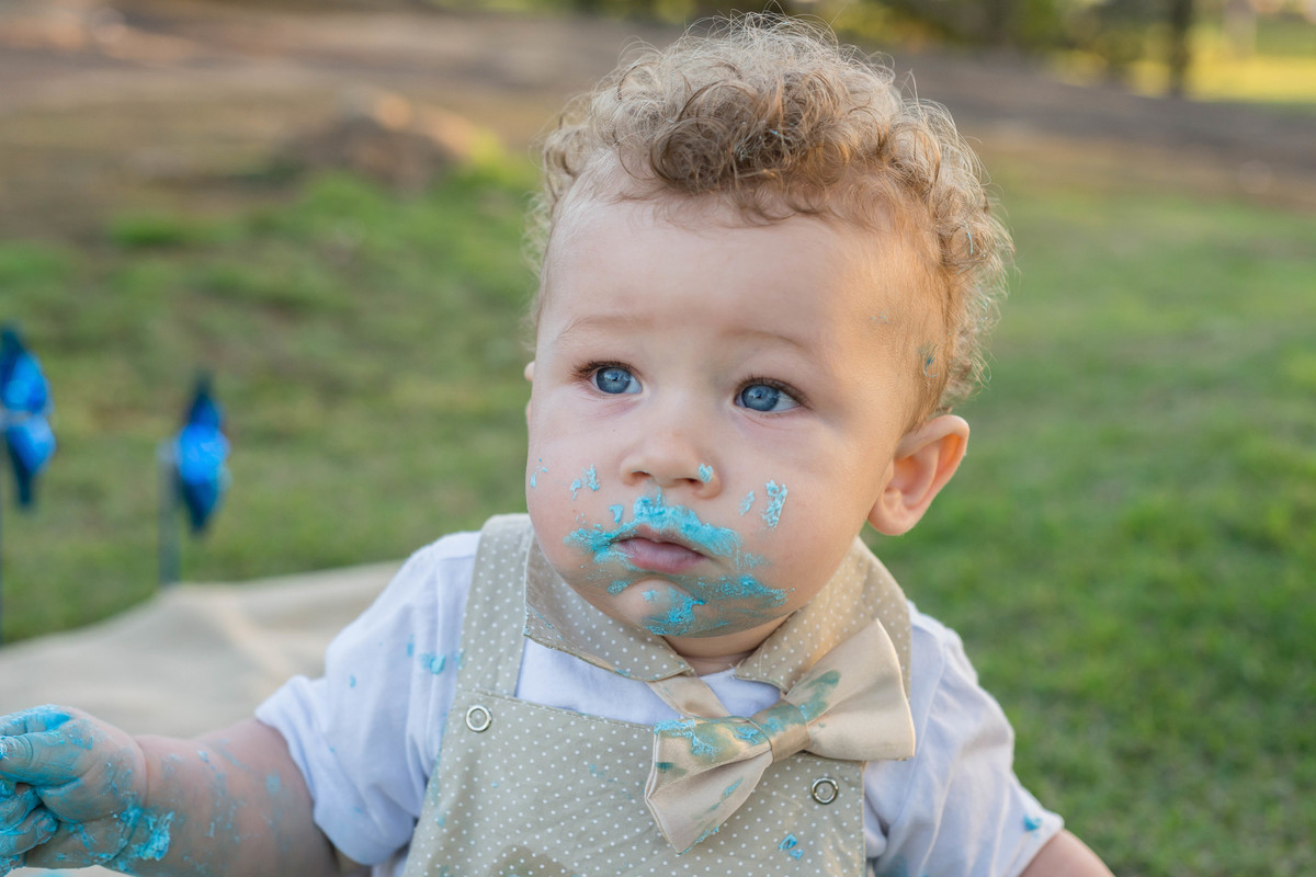 Criança com olhos azul pelo fotógrafo Douglas Maia