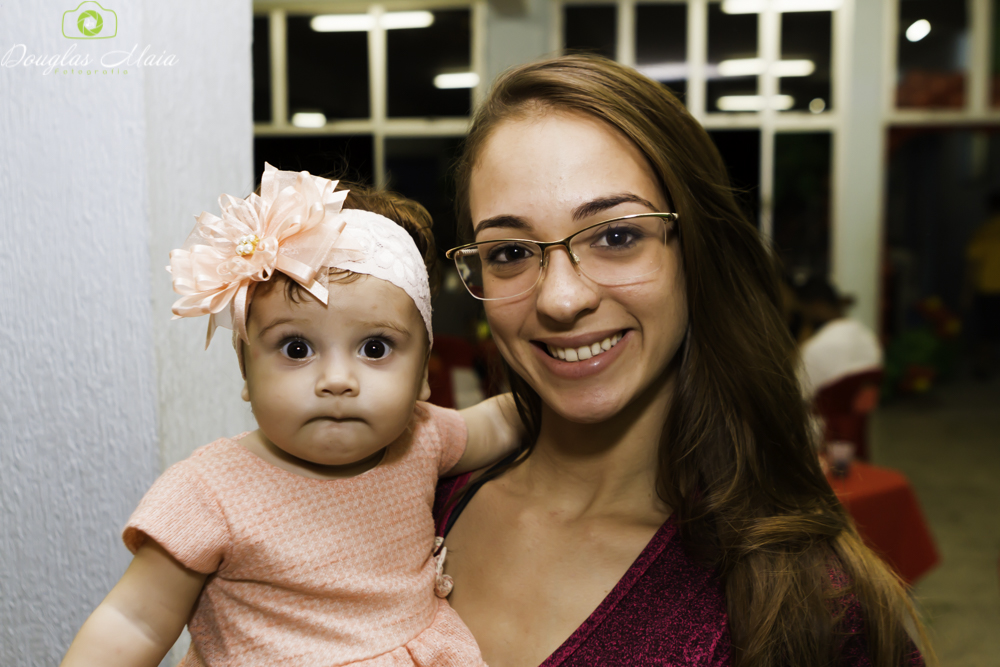 Mulher com bebê pelo fotógrafo Douglas Maia