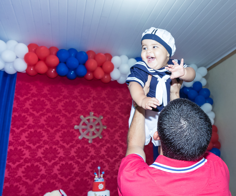 Arthur sorrindo com o pai pelo fotógrafo Douglas Maia
