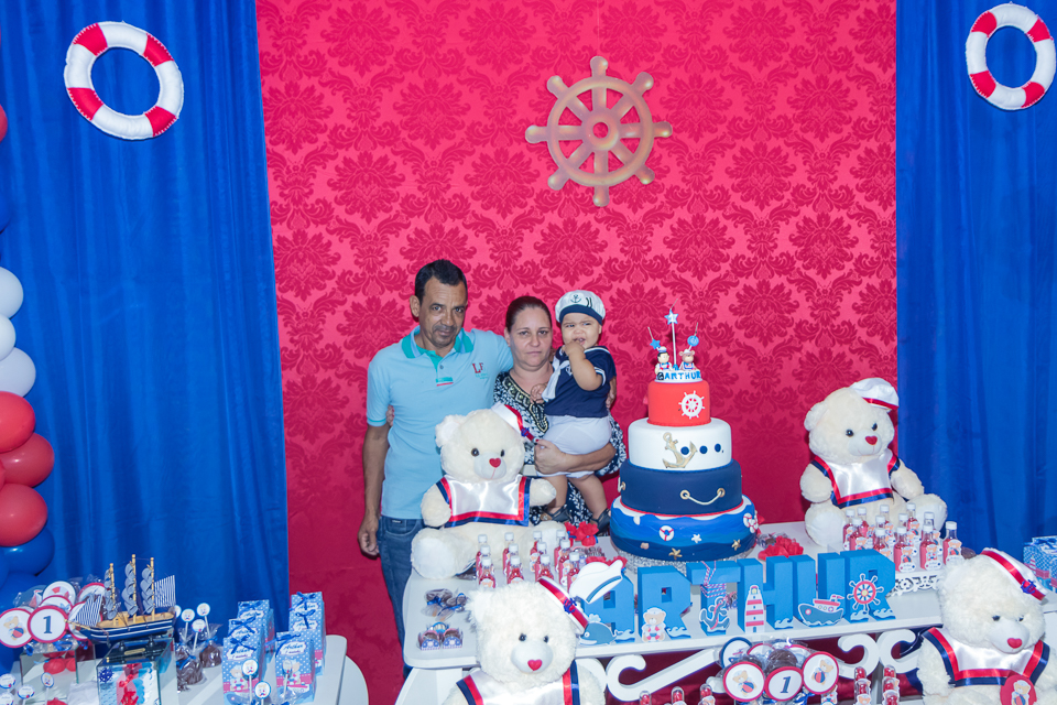 Arthur no colo de convidada pelo fotógrafo Douglas Maia