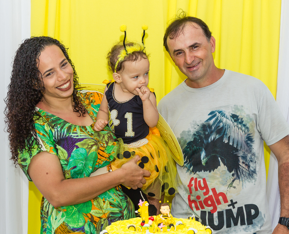 Família sorrindo pelo fotógrafo Douglas Maia