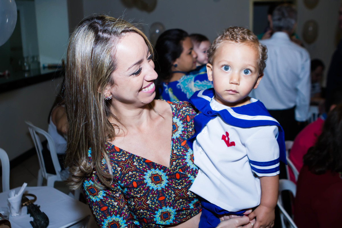 Rafael no colo da mãe pelo fotógrafo Douglas Maia