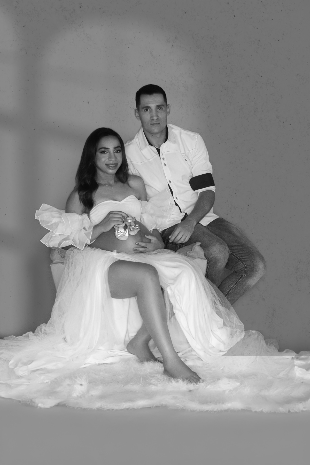 A família reunida, celebrando a vida que se aproxima, um amor que se multiplica