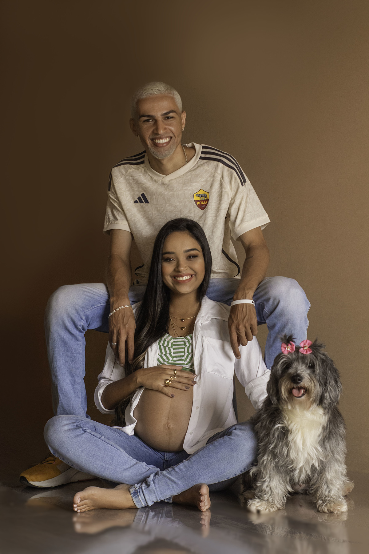 Liz, a integrante especial da família, compartilhando a alegria da espera.